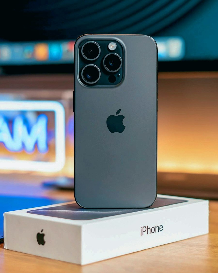 Pre-owned iPhone Pro standing on its retail box